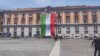 Celebrazione della Festa della Repubblica a Napoli con inno e tricolore sulla Prefettura.
